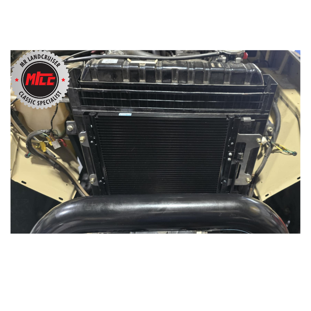 front view of Landcruiser 40 series Universal O-Ring PF Condenser installed with brackets