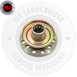 A metal Land Cruiser differential carrier housing or spline component, shown against a white background with a large faint MR LANDCRUISER logo and a smaller circular MITE specialist badge in the top-left corner.