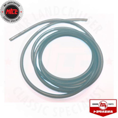 close up of Genuine Toyota windshield washer hose for 40 series landcruiser
