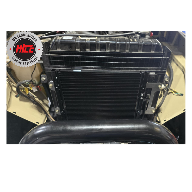 front view of Landcruiser 40 series Universal O-Ring PF Condenser installed with brackets